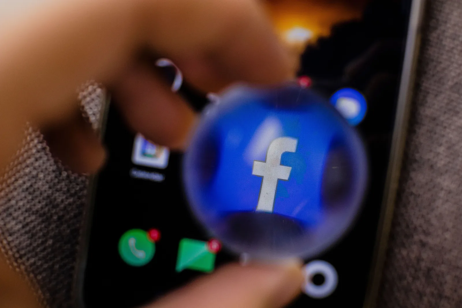 Close-up of a smartphone screen showing the Facebook app icon (photo: Pexels, https://www.pexels.com/photo/close-up-shot-of-a-smartphone-8296051/)